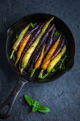 roasted  rainbow carrots on pan