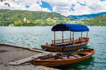 Naklejka na ściany i meble Tourist boat on the Bled lake, Slovenia