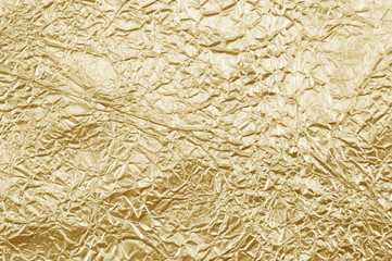 Shiny yellow leaf gold foil texture