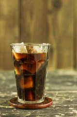 Iced coffee black coffee on wood table
