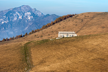 Old farm house (malga) for the breeding of cows. Plateau of Lessinia, Veneto, Italy