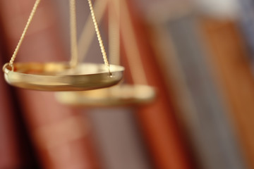 Golden balance scales, closeup