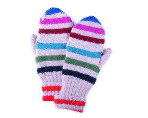 Warm mittens on white background