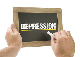 Depression / Hand schreibt auf Kreidetafel