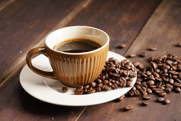 Coffee cup and coffee beans