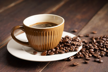 Coffee cup and coffee beans