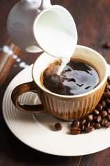 Coffee cup and coffee beans