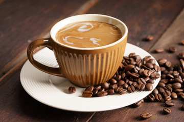 Coffee cup and coffee beans