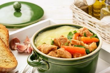 Turkey goulash stewed with vegetables and mashed potatoes. 