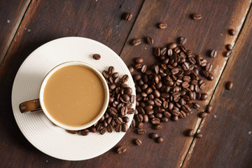 Coffee cup and coffee beans