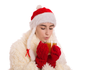 fun miss santa with cup of tea isolated on white background