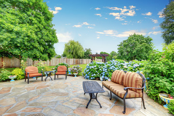 Well designed patio area with stone floor.