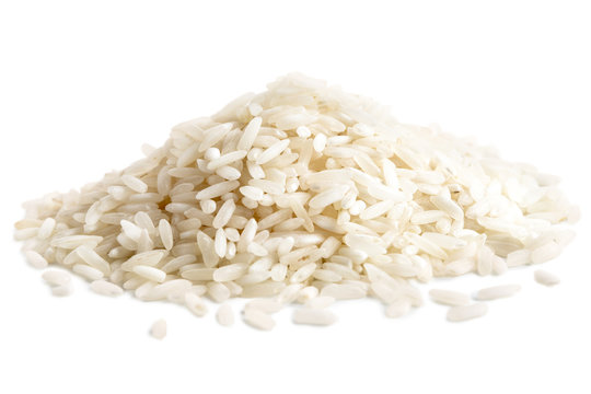 Pile of long grain white rice isolated on white.
