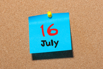 July 16th. Day 16 of month, color sticker calendar on notice board. Summer time. Close up