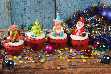 Christmas cupcakes with colored decorations