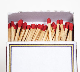 Matchsticks and box on isolated background