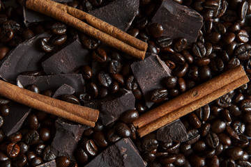 roasted coffee beans with chocolate and cinnamon close up