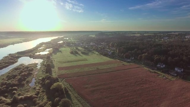 aerial landcape of river in green meadows