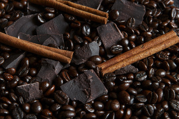 roasted coffee beans with chocolate and cinnamon close up