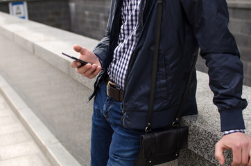 Young man using his phone