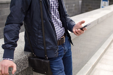 Young man using his phone