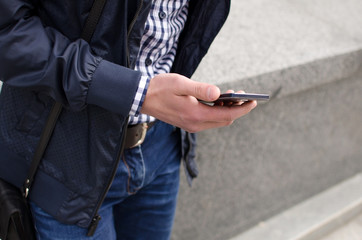 Young man using his phone