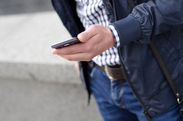 Young man using his phone