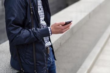 Young man using his phone
