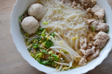 vermicelli with pork ball in soup on bowl