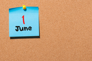 June 1st. Day 1 of month, color sticker calendar on notice board. Summer time. Empty space for text
