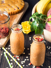 Fruit smoothie with rolled oats. Vertical