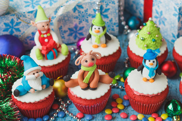 Christmas cupcakes with colored decorations