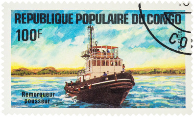 Pusher tug on postage stamp