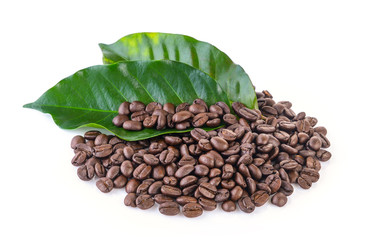 coffee grains and leaves on white background