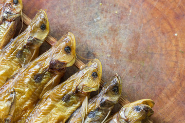 Dried fish on wooden