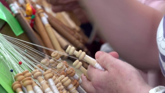 old hands making tatting