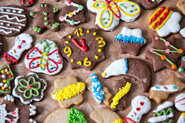 Obraz na płótnie Canvas christmas cookies with icing and sprinkles