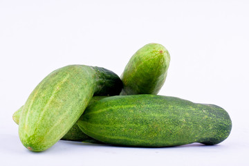 green cucumbers has full vitamin on white background healthy vegetable food isolated
