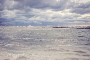 Beautiful landscape with dramatic sky above the choppy sea in th