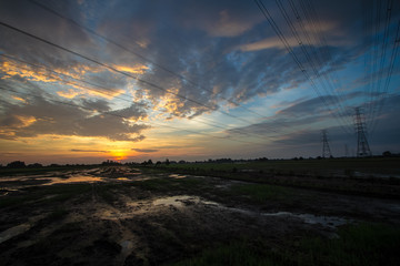 Fototapeta na wymiar country roads in Thailand with sunset