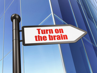 Studying concept: sign Turn On The Brain on Building background
