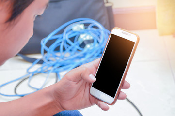 Man hand holding smartphone.