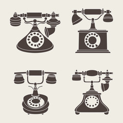 Set of vector retro phones on a gray background