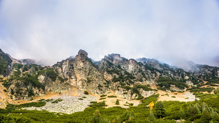 Fototapeta na wymiar Beautiful Rocky View High In The Mountain