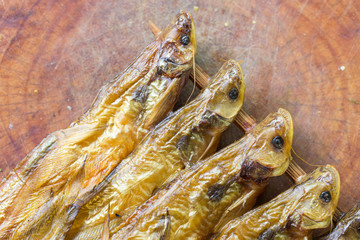 Dried fish on wooden