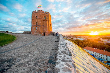 View on Gediminas tower on the castle hill during the sunset in the old town of Vilnius city in Lithuania. This tower is very popular tourist destination in Vilnius