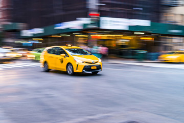 NYC taxi in motion. Blurred, long exposure images.