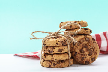 chocolate chunk cookies on a bright blue background