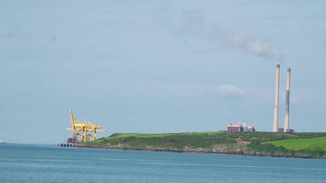 Travelling along the river in Killimer Ireland with the lighthouses in the river side