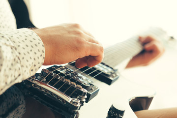man playing electric guitar © fotofabrika